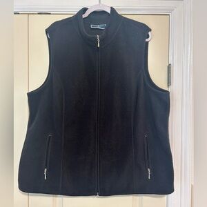 Women’s plus black fleece vest.